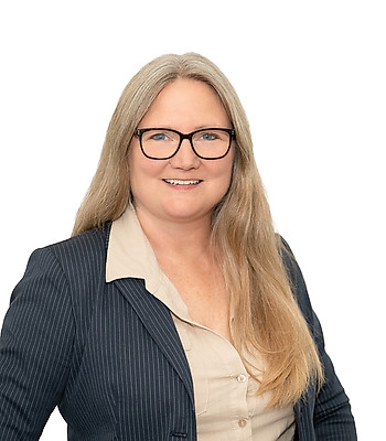 Portrait of Michelle Origer, REALTOR®.